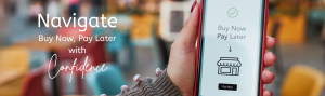 Woman holding a smart phone with a buy now pay later option in a storefront app.