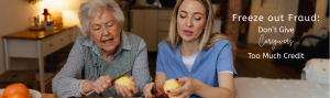 Old woman and young woman peeling potatoes together at a table.